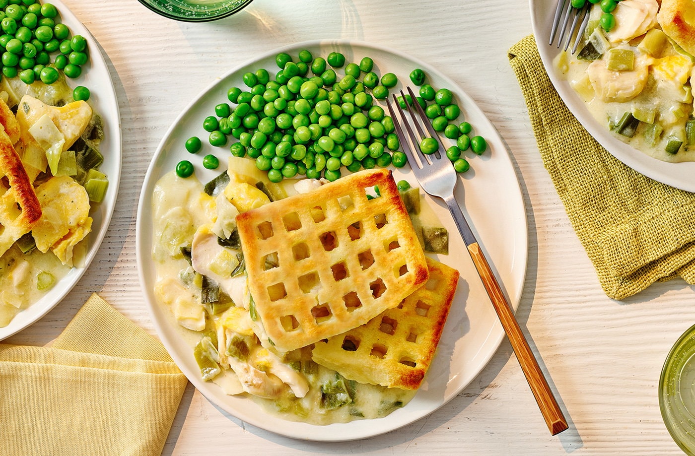 Creamy leek smoked fish with potato waffle topping
