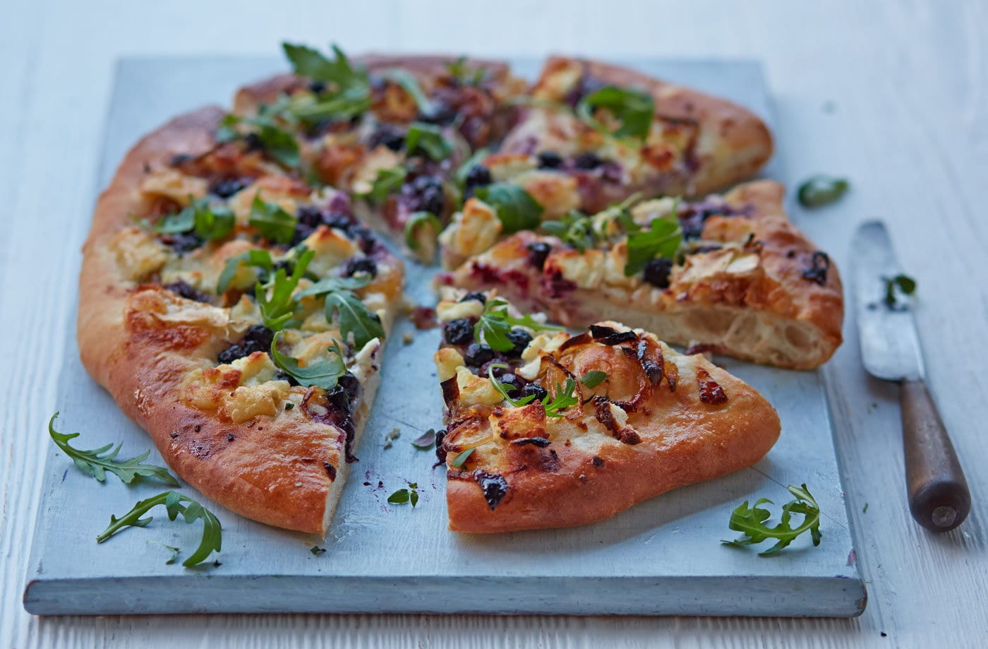 Blueberry and goat's cheese pizza