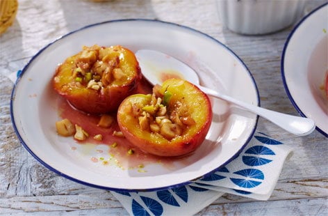 Image of "Baked caramelised peaches with salted nuts"