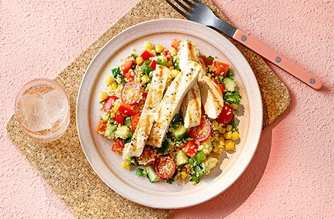 Image of "Rainbow veggie couscous salad with grilled chicken"