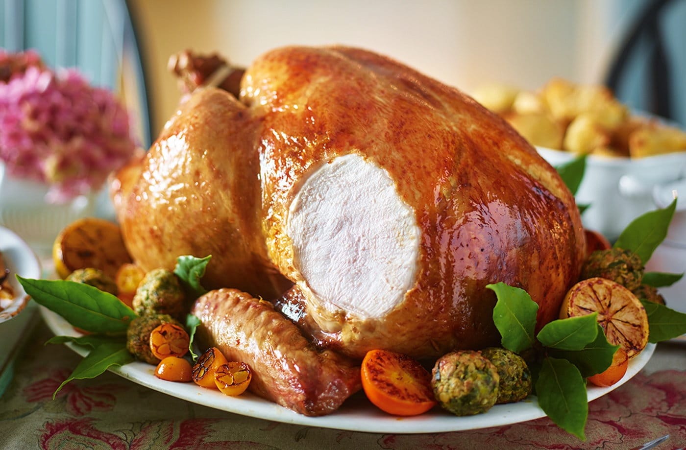 Roast turkey with citrus butter, pistachio stuffing and cranberry gravy