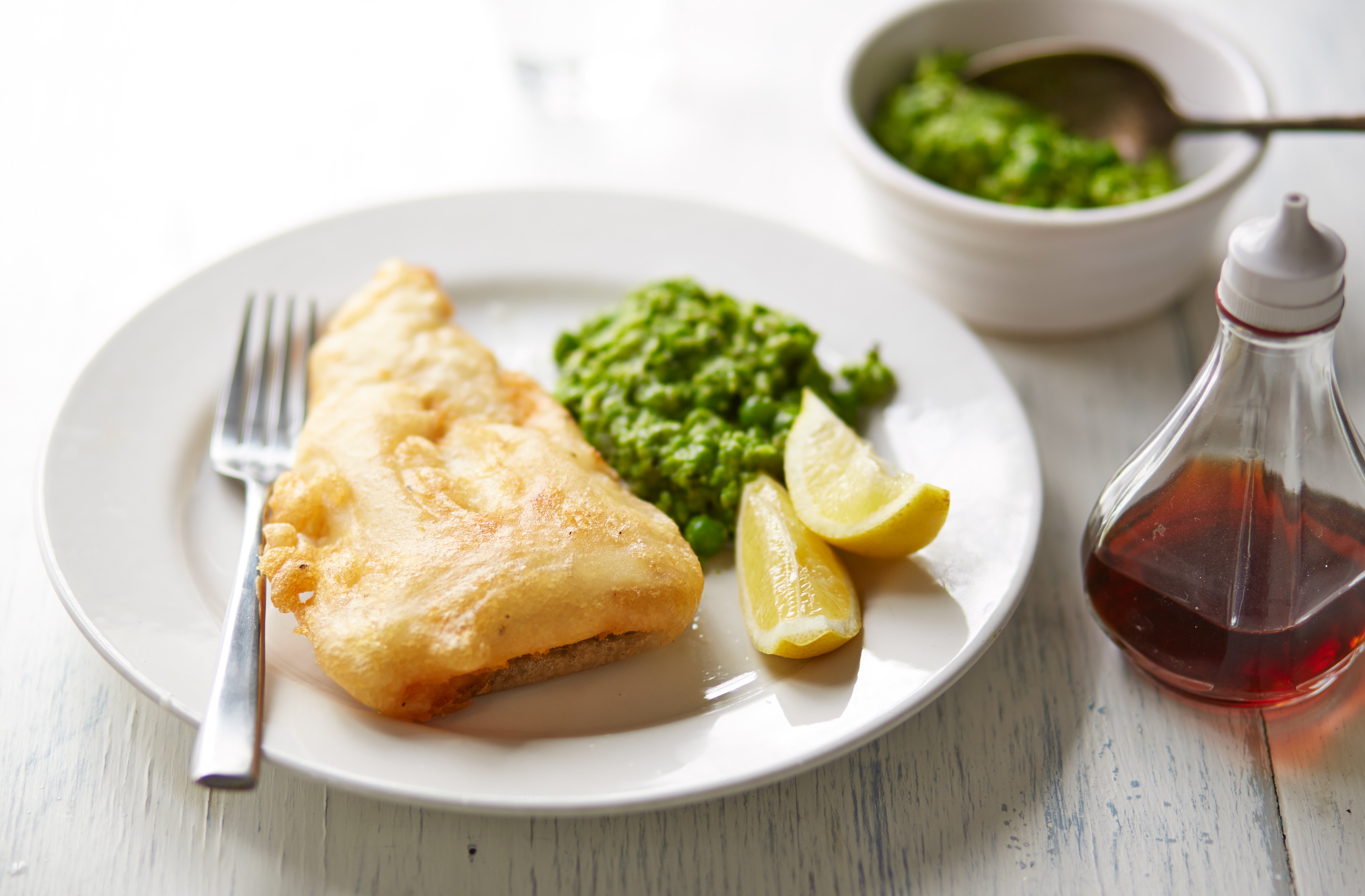 Gluten-free battered cod and mushy peas
