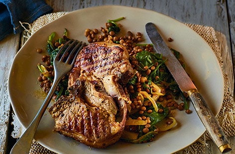 Image of "Caramelised onion and spinach lentils with peppered lamb chops"