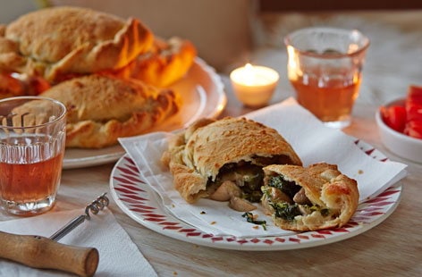 Image of "Cheesy mushroom and spinach calzone"