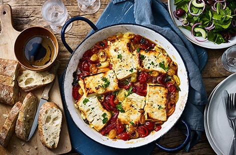 Image of "Baked feta and tomatoes with cucumber salad"