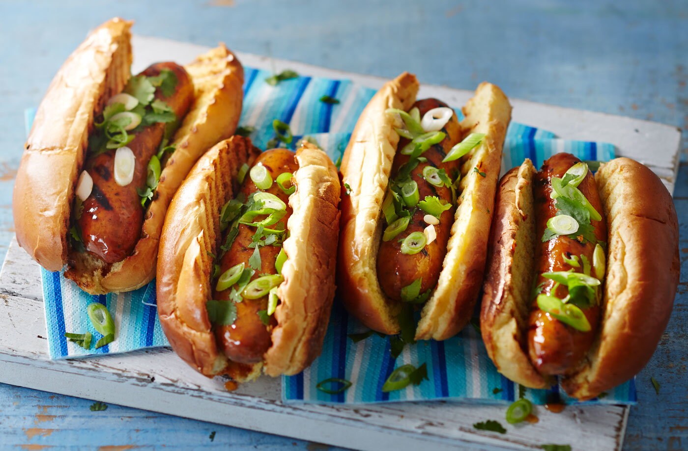 Spicy hot dogs with sweet and sour glaze