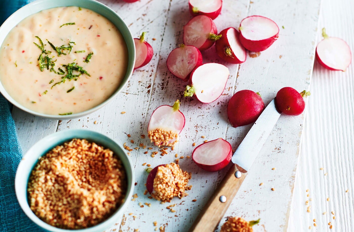 Spring radishes with chilli and lime mayo and toasted sesame seeds