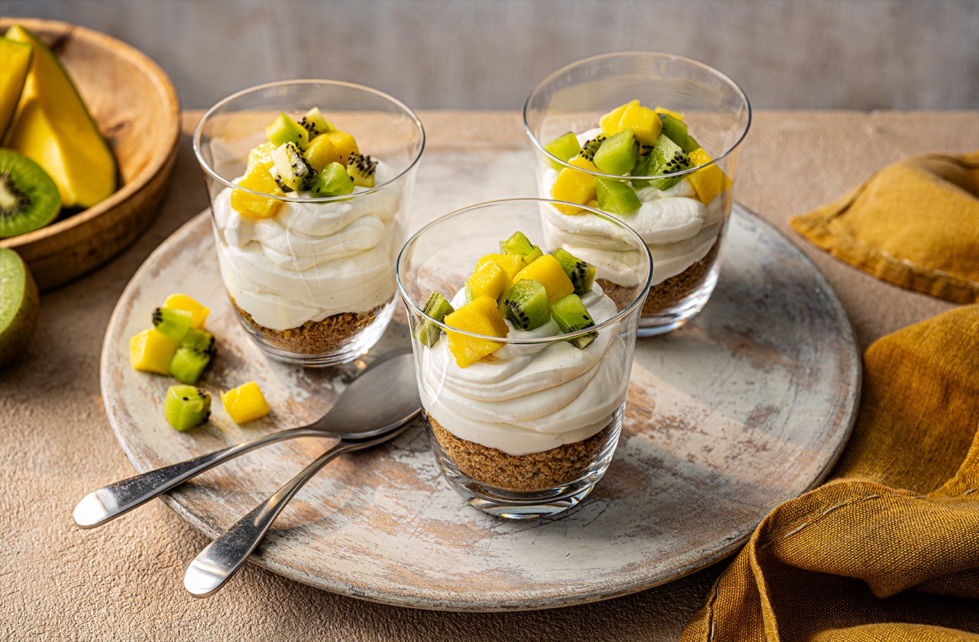Mini mango and kiwi cheesecake pots