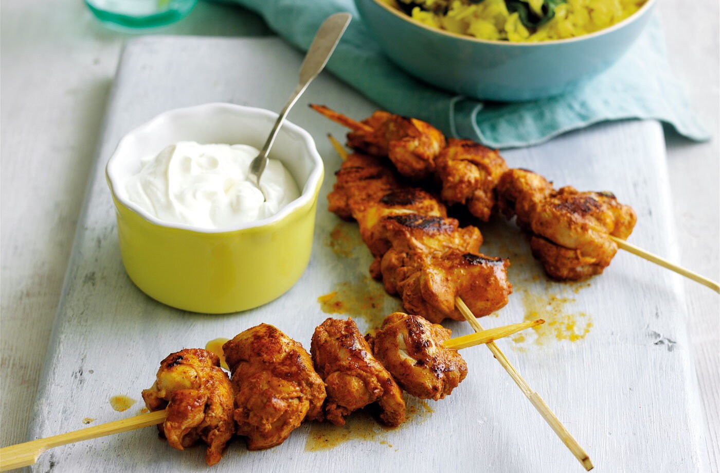 Spiced chicken skewers with herby rice