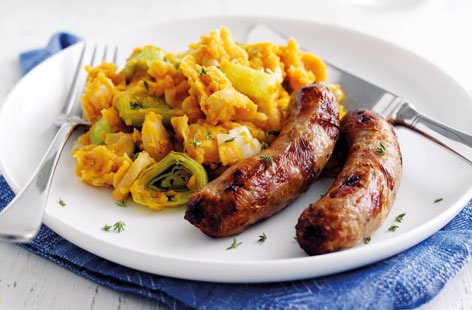 Image of "Sausages with tomato, leek and butter bean mash"