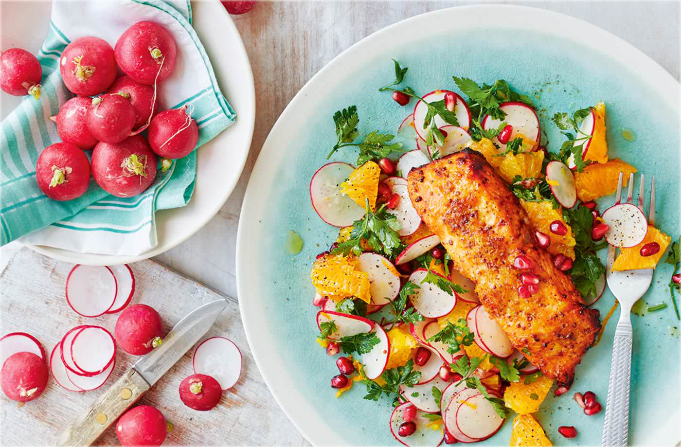 Trout with radish, orange and pomegranate salad
