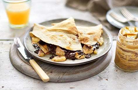 Image of "Cinnamon-spiced peanut butter and banana quesadilla"