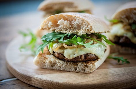 Image of "Marcus Wareing's mini beef burgers with houmous"