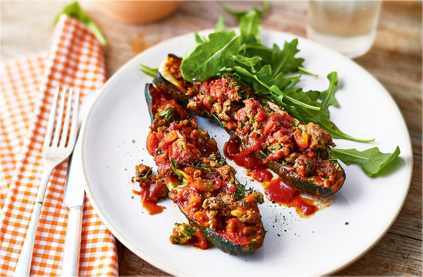 Stuffed courgettes in tomato sauce