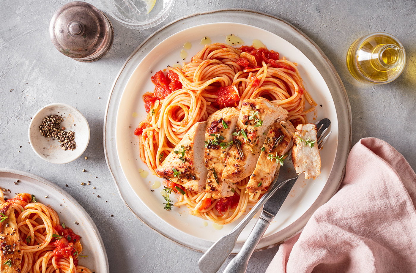 Olive oil and herb marinated chicken with tomato spaghetti