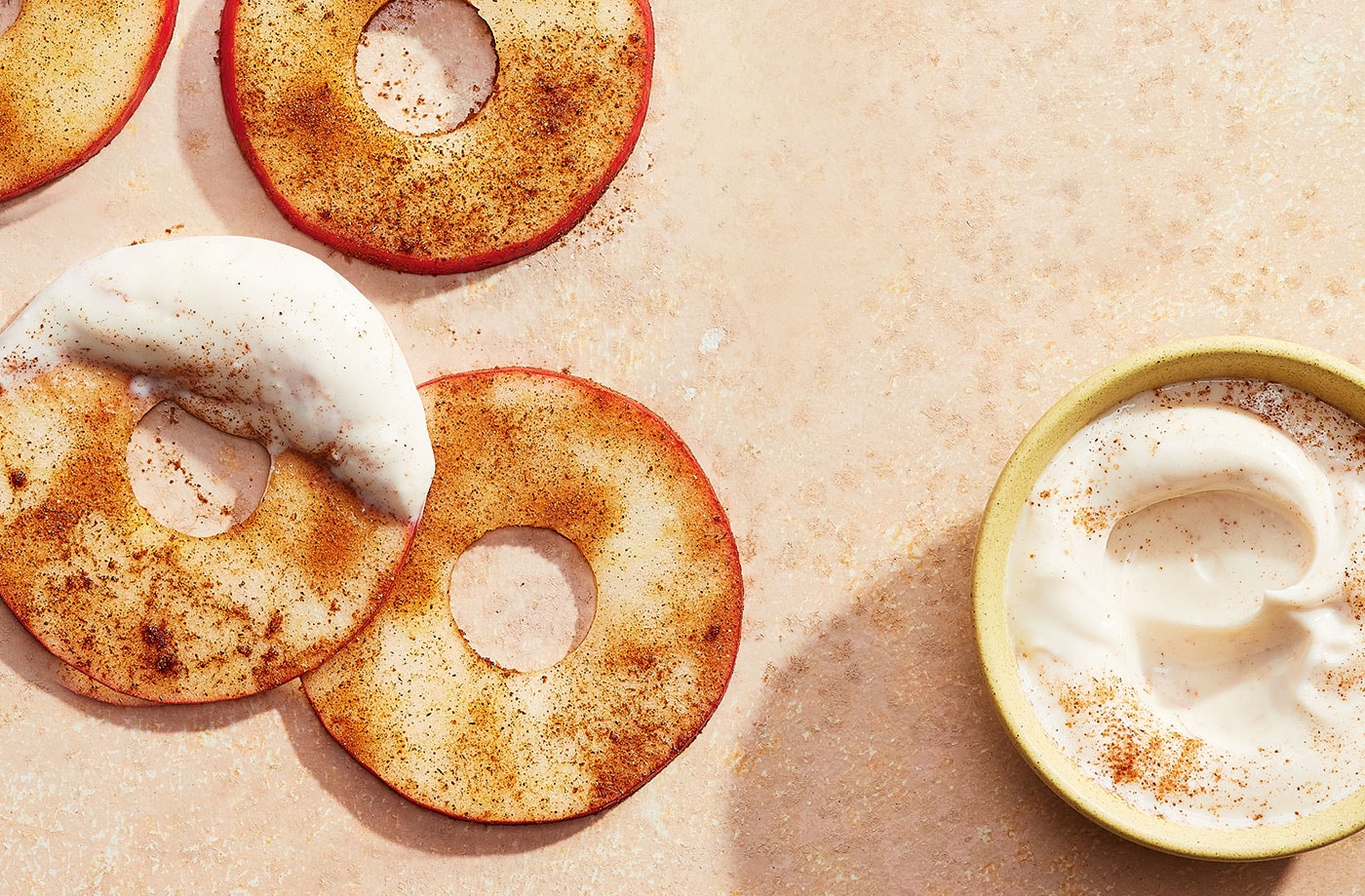 Apple 'doughnuts' with maple-tahini dip