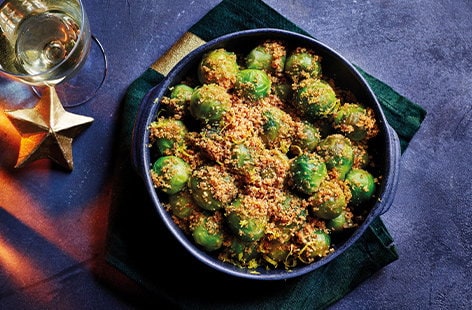 Image of "Brown butter sprouts with crispy garlic crumbs"