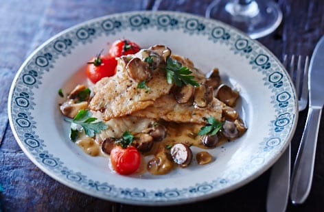 Sea bass with cider and mushroom sauce