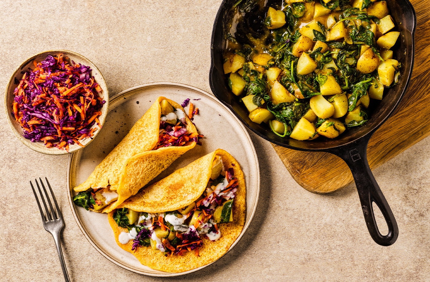 Red lentil dosa pancakes with potato and spinach