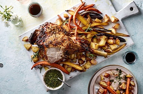 Image of "Salted honey and rosemary lamb with roasties and rainbow carrots"