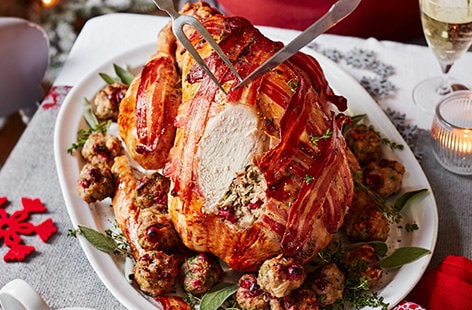 Image of "Turkey with maple butter, walnut-cranberry stuffing and juniper gravy"