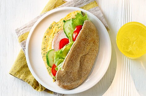 Image of "Ham and pea frittata sarnies"