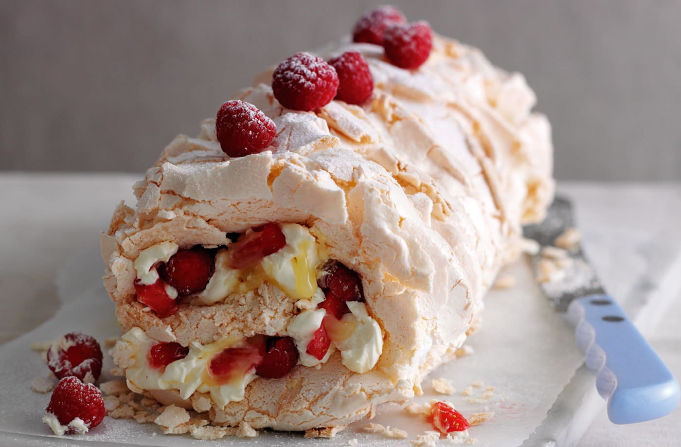 Red berry meringue roulade