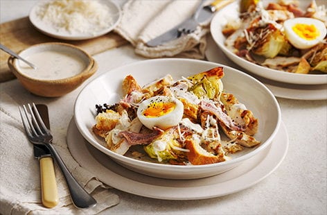 Image of "Charred cabbage chicken Caesar salad"