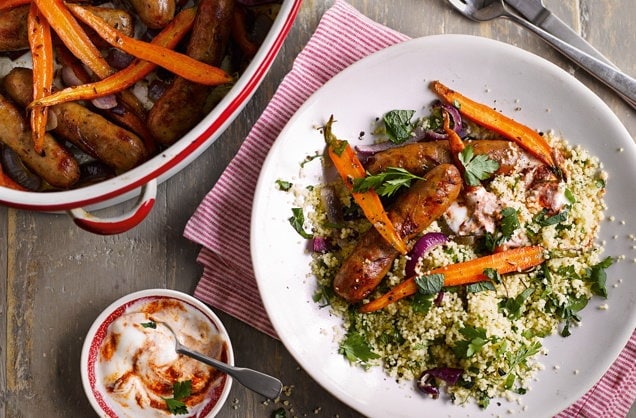 Sticky sausages with carrots and couscous