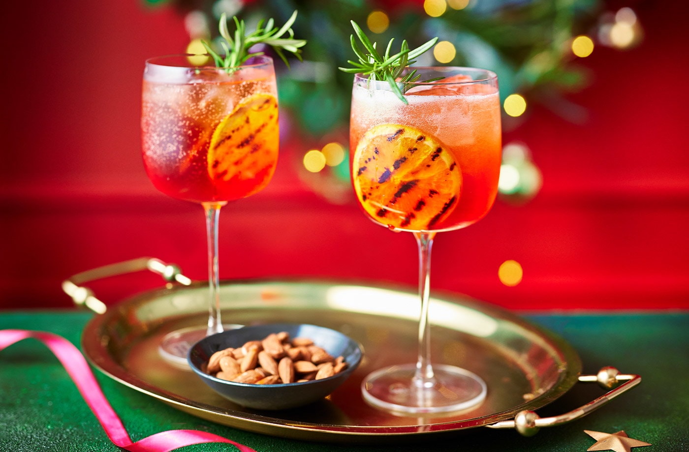 Charred orange and cranberry Aperol spritz