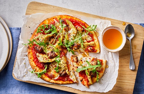 Image of "Spicy sausage pizza with hot honey"