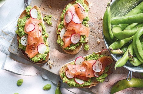 Image of "Salmon, smashed avocado and broad bean bruschetta"