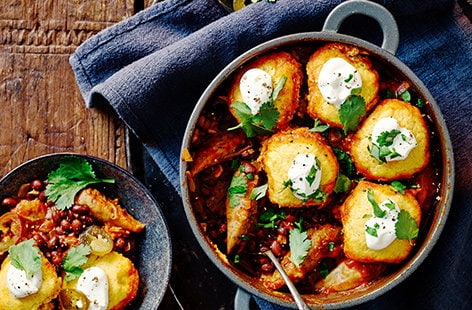 Image of "Spicy banger stew with cornbread dumplings"