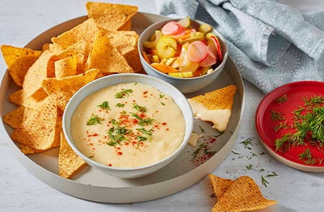 Image of "Mix 'n' match cheese fondue nachos"