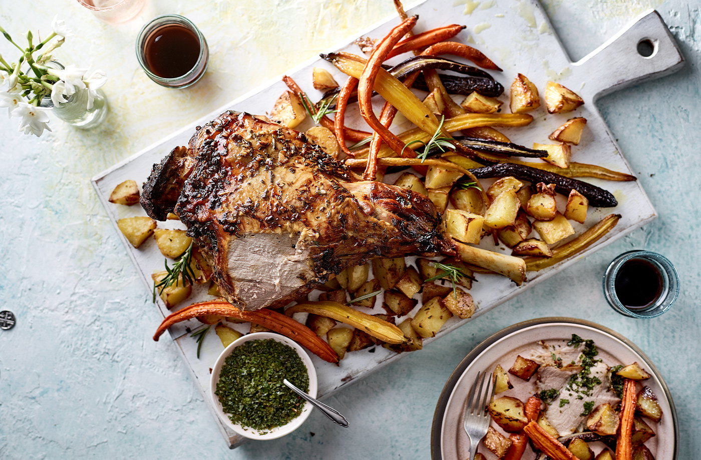 Salted honey and rosemary lamb with roasties and rainbow carrots