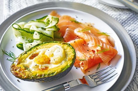 Image of "Eggs baked in avocado with smoked salmon"