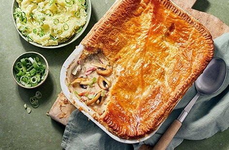 Image of "Mushroom and bacon pie with creamy mash"