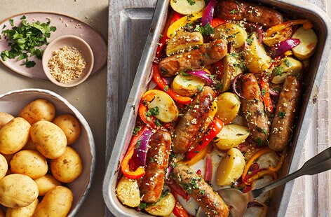 Image of "Sausage and Jersey Royal traybake"