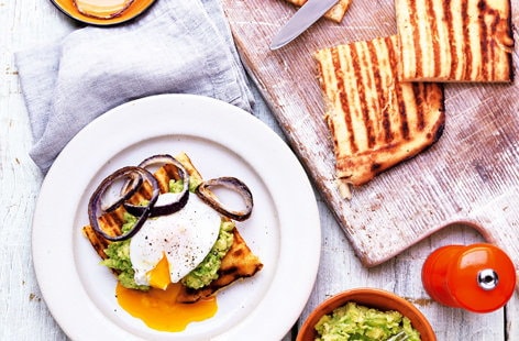 Image of "Waffle with avocado and poached eggs"