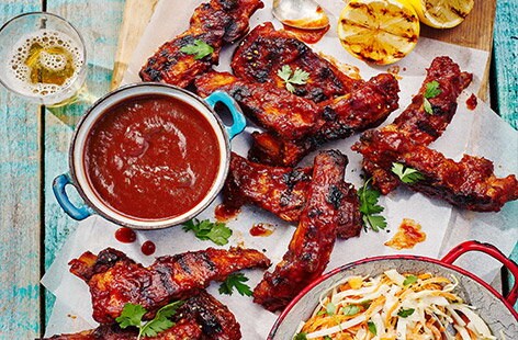 Image of "Texas-style ribs, BBQ sauce and slaw"