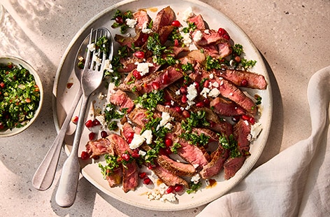 Sirloin steak with chimichurri, feta and pomegranate