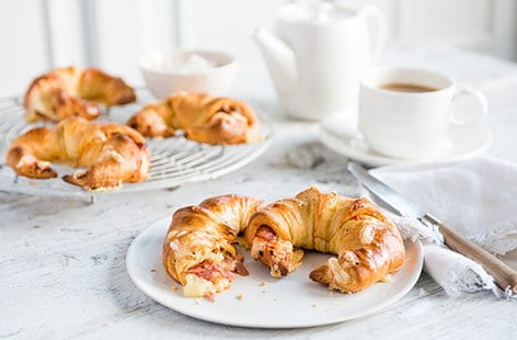 Image of "Cheese, sundried tomato and ham-stuffed croissants"