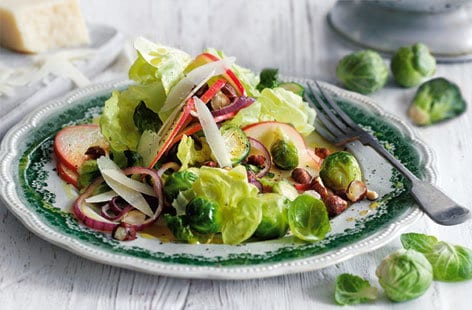Image of "Winter salad of roasted sprouts, red onion and apple"