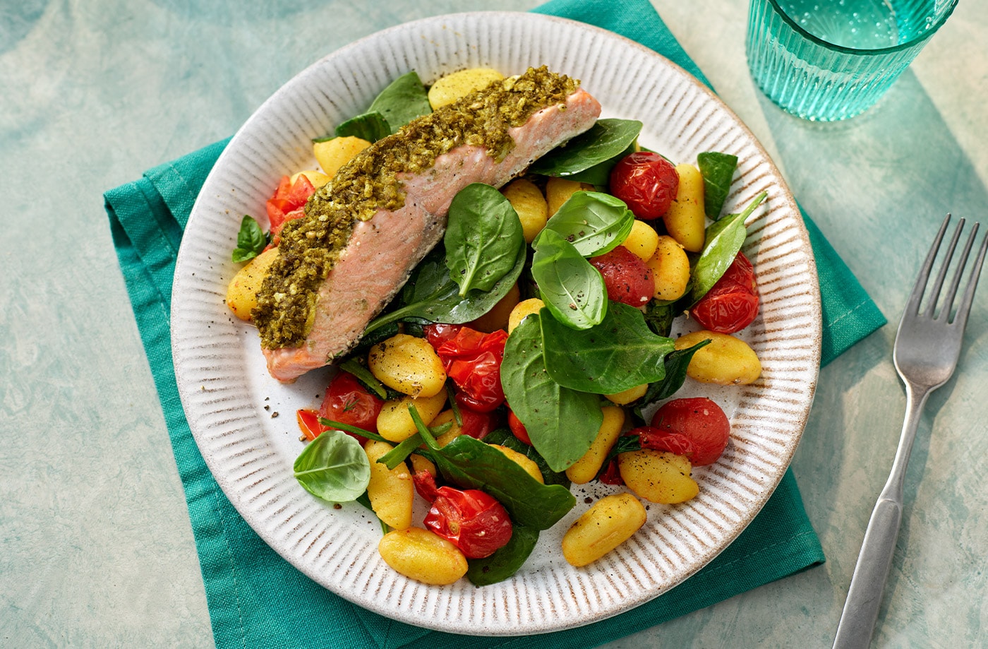 One-tray pesto salmon with gnocchi and tomatoes