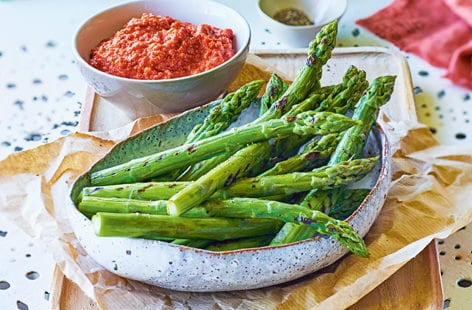 Image of "Griddled asparagus with romesco sauce"