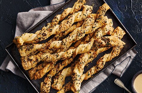 Image of "Tahini, garlic and parsley twists"