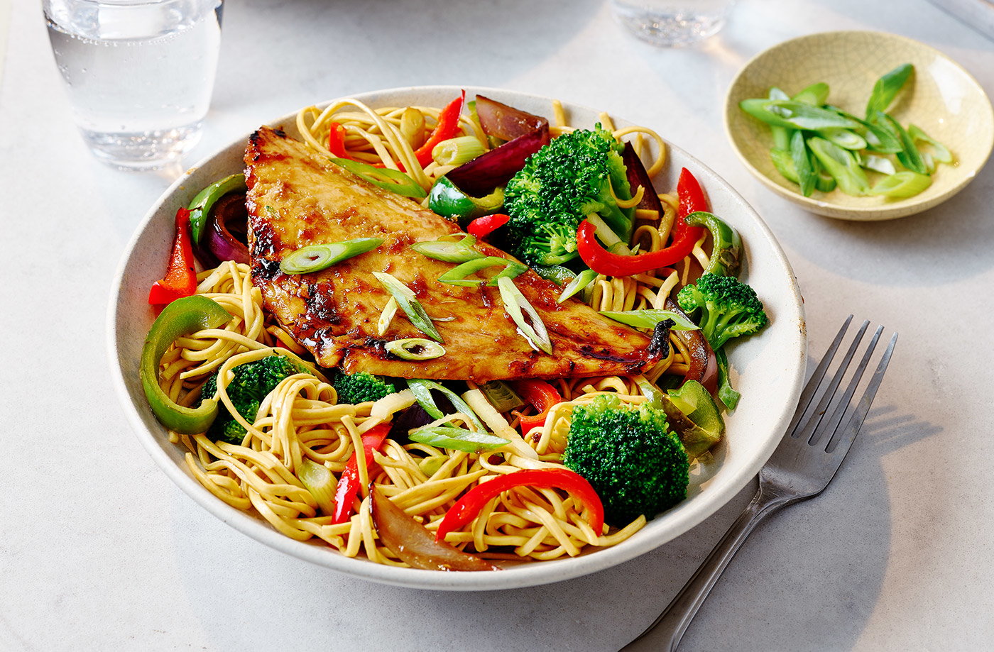 Grilled teriyaki fish with veg and noodles