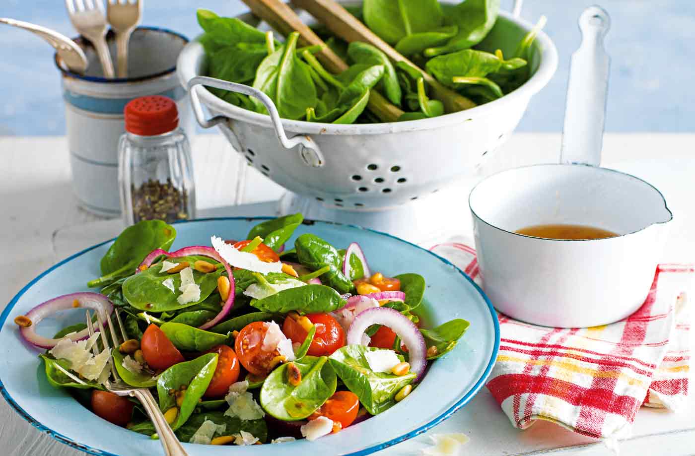 Spinach salad with warm lemon and garlic dressing