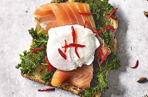 Image of "Kale, poached egg and smoked salmon toast topper"