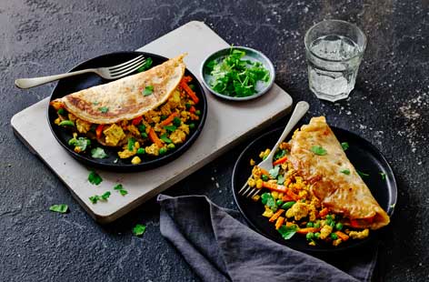 Image of "Nigerian pancakes with suya-spiced scrambled tofu"